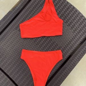 Bright orange two piece bikini.